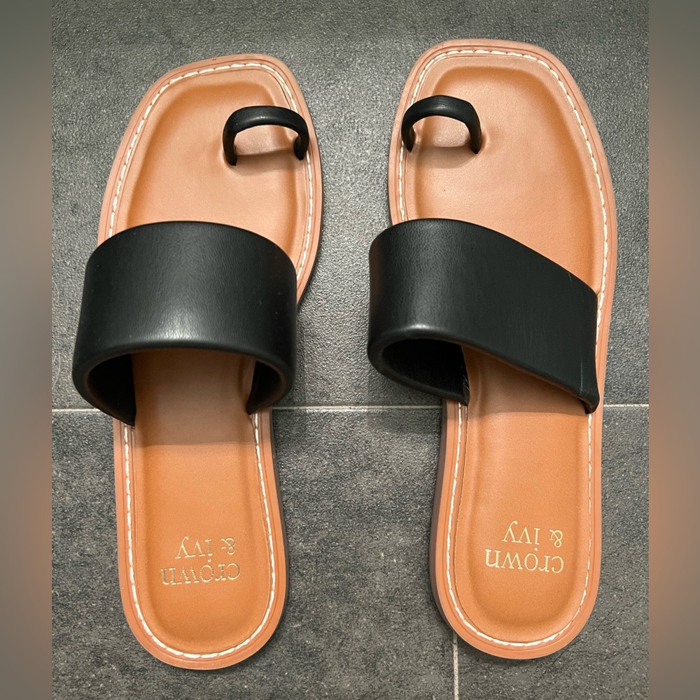 Women’s black sandals.  Never worn.  Size 8